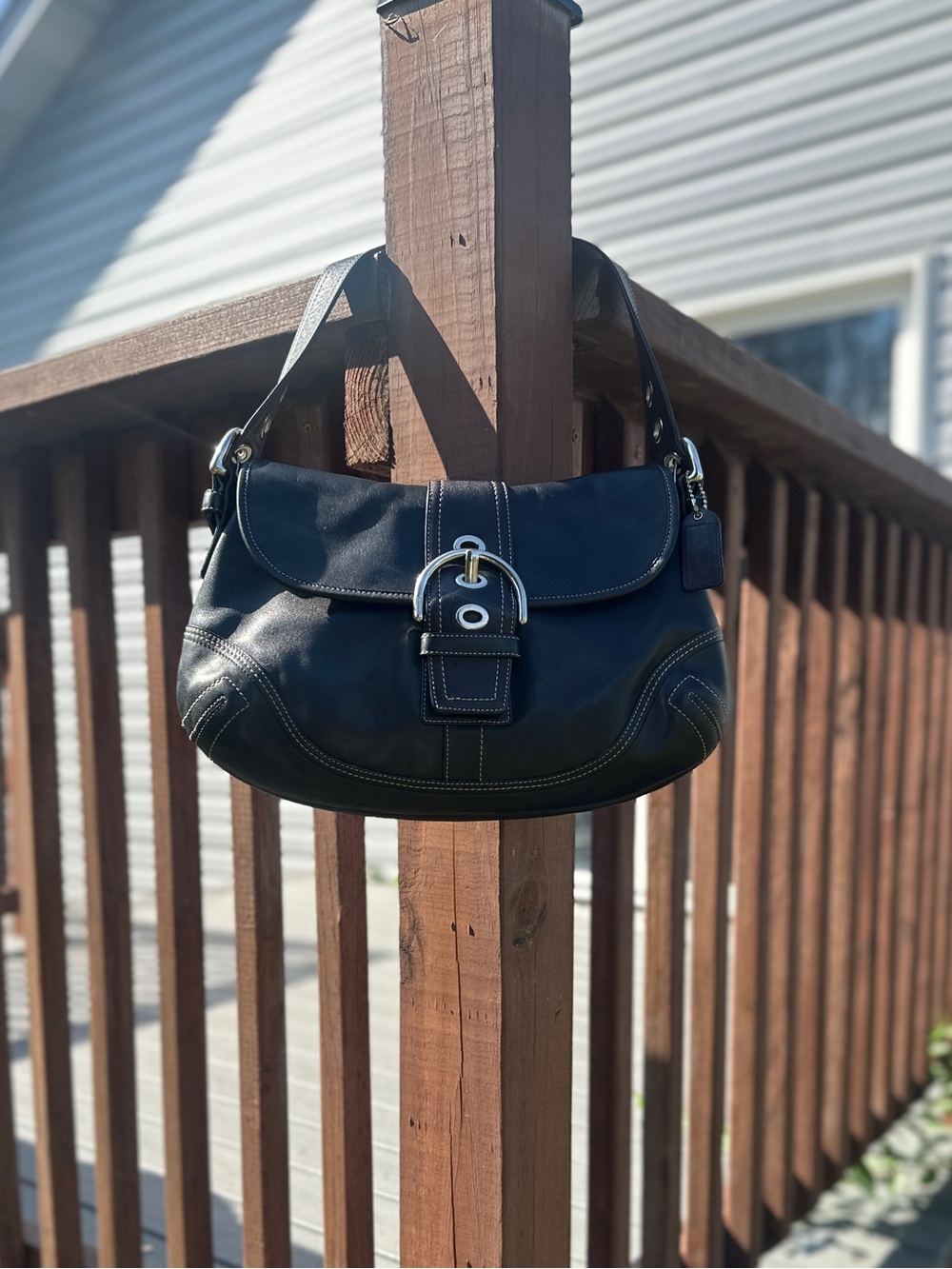 Vintage Coach soho buckle flap black all leather bag
